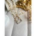Collier pendentif rectangle à zircons blancs