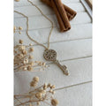 Collier Clé circulaire à zircons