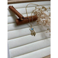 Collier coeur avec ain avec plumes