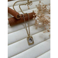 Collier livre diamant