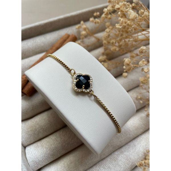 Bracelet trèfle bombé noir et contour en zircons