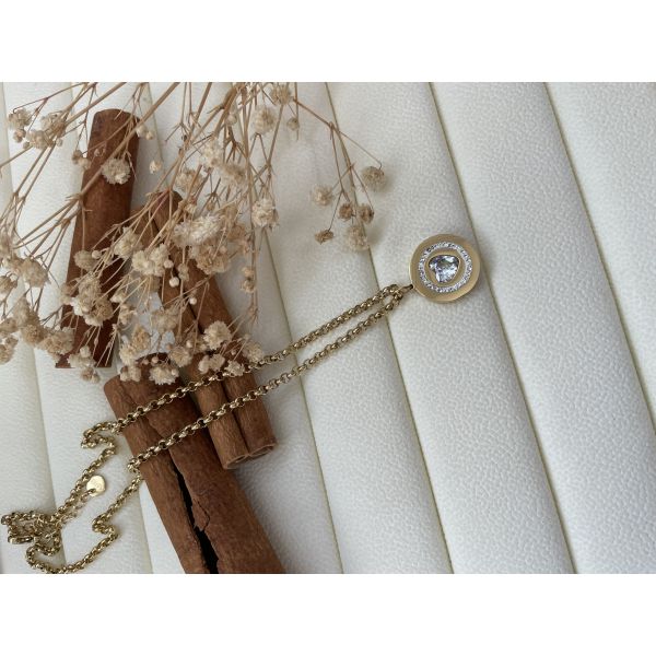 Collier disque doré coeur diamant