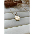 Collier téte