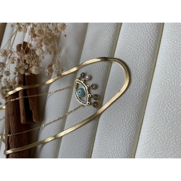 Collier a double chaine doré pendentif oeil